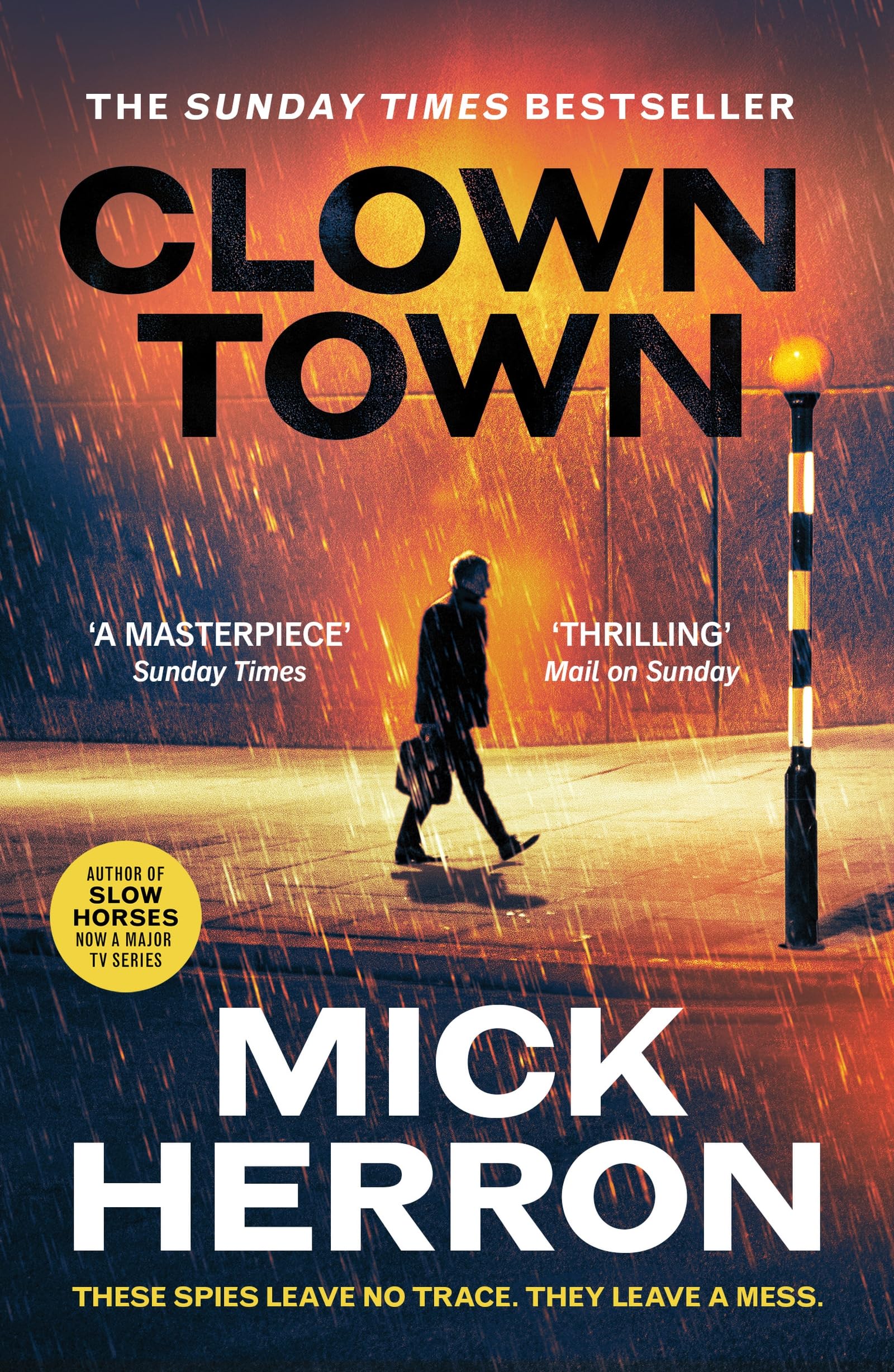 Baskerville Clown Town: The Thriller for Our Chaotic Times (Slough House Thriller 9) Paperback